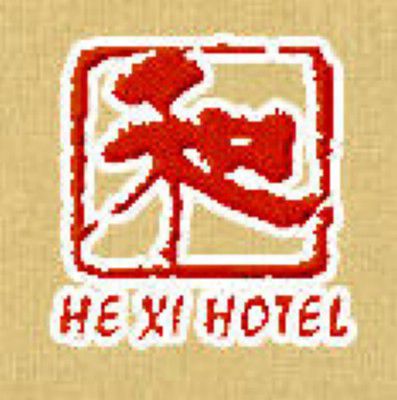 He XI Resort Hotel Li-ťiang Logo fotografie